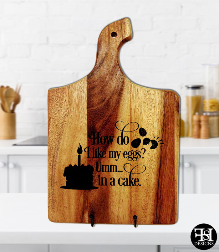 "How Do I Like My Eggs? Umm... In A Cake" Curved Handle Acacia Wood Cutting Board
