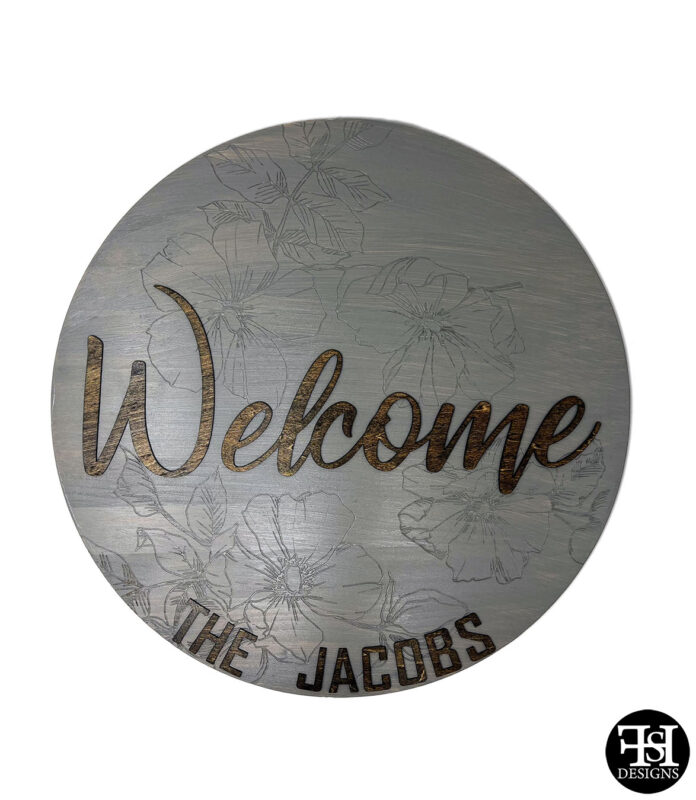 Welcome - The Jacobs with Deep Engraved Flowers Background